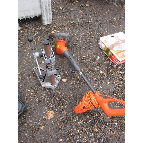 3436 - A Flymo strimmer and a pillar drill stand.  DTI Failure: Please see information pages