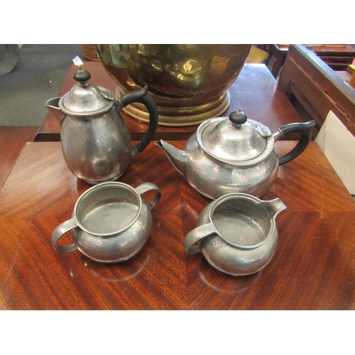 1476 - A Liberty Tudric Pewter teapot, coffee pot, sugar bowl and milk jug