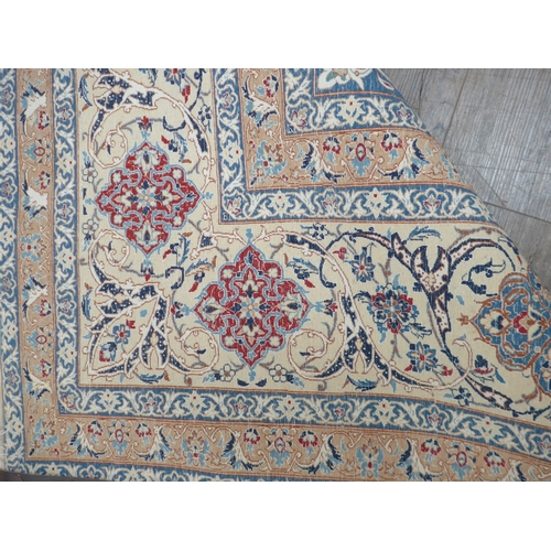 6462 - A Persian rug of large proportions, cream ground, multiple borders all over scroll foliate pattern, ... 