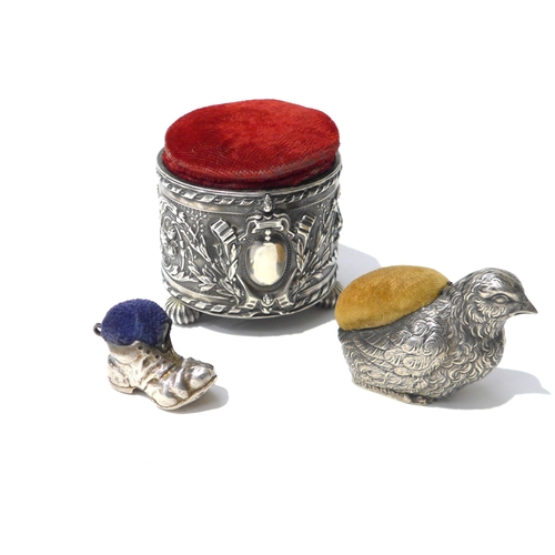 6421 - Three silver pin cushions including Chick, 3.7cm tall marks rubbed, boot 2.2cm tall and embossed pot... 