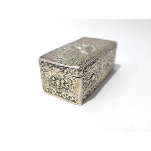 6397 - A 19th Century imported silver trinket box with embossed scene to top, London 1891 worn and small ho... 