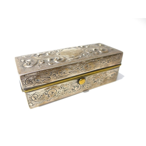 6394 - A silver brass lined slim ring/jewellery box with embossed acanthus and scroll detail, London 1896, ... 