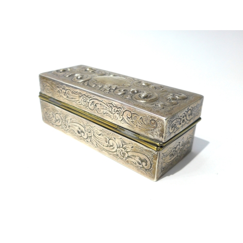 6394 - A silver brass lined slim ring/jewellery box with embossed acanthus and scroll detail, London 1896, ... 