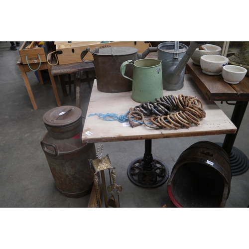 2035 - A oak topped, cast iron base table