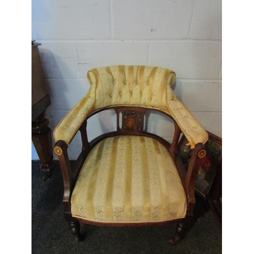 1015 - A pair of late Victorian/early Edwardian tub armchairs, upholstered with yellow stripe and button ba... 