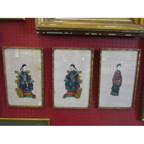 1053 - A set of three Oriental silk overpainted prints depicting figures in robes, gilt framed and glazed, ... 