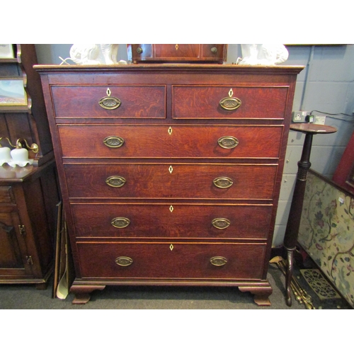 1080 - A Georgian oak chest of drawers, two short over four long drawers, bone escutcheons, 143cm tall x 12... 