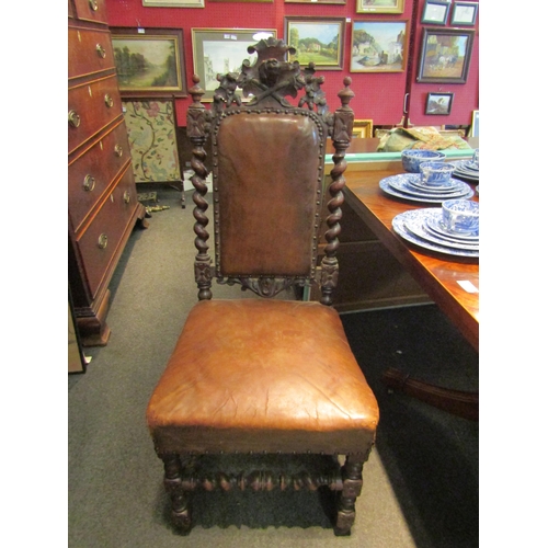 1100 - A pair of 19th Century Carolean style walnut high-back chairs, carved crest over barleytwist support... 