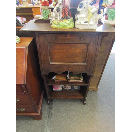 1108 - An oak student's bureau bookcase with key, 108cm tall x 76cm wide x 22cm deep