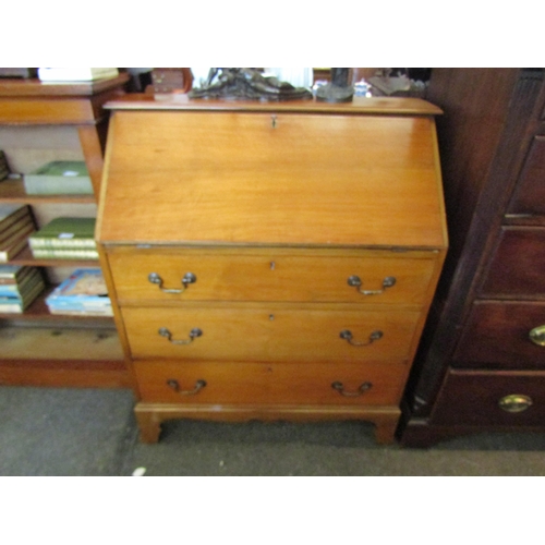 1126 - A 20th Century satin walnut bureau, drop-flap, three long drawers on bracket feet, 102cm tall x 86cm... 