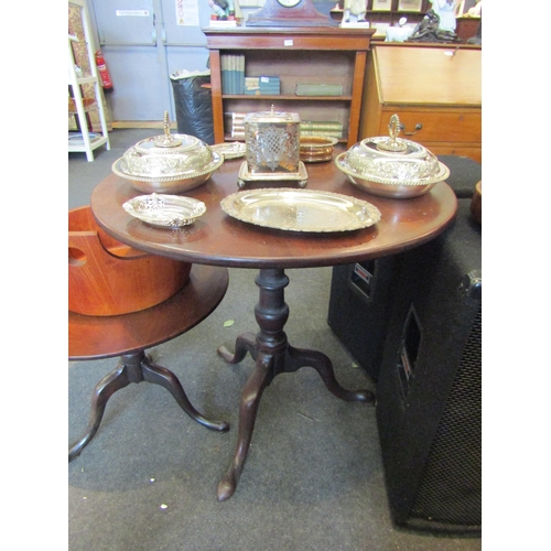 1139 - A 19th Century mahogany tripod wine table, 70cm tall x 77cm diameter