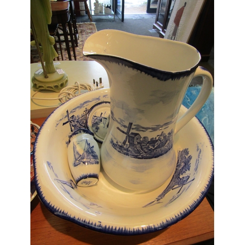 1150 - A blue and white wash set with scenes of sailing vessels and windmills (4)