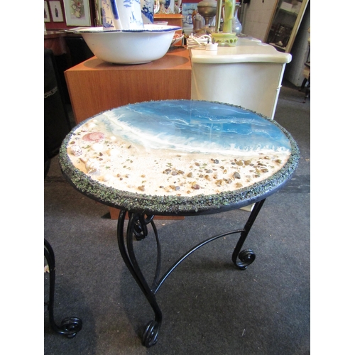 1171 - A set of three seaside design occasional tables with applied shells and resin waves, largest 62cm ta... 