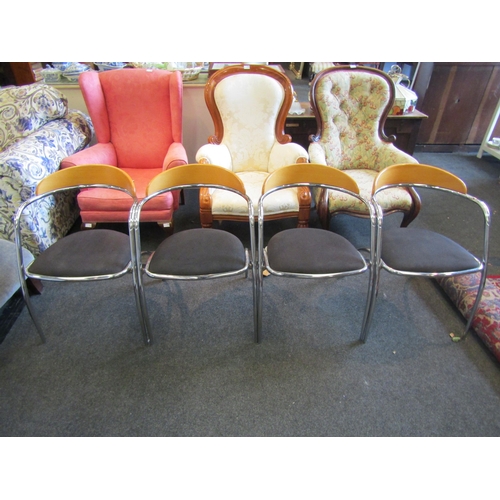 1199 - A set of four Italian Effezeta dining chairs on chromed tubular bases