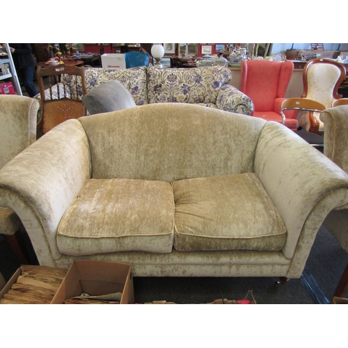 1200 - A modern deep-seated two seater settee with grey/beige velvet effect upholstery, on castors, togethe... 