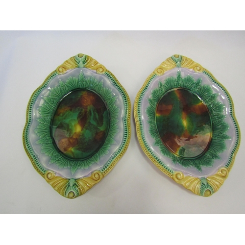 1329 - A pair of Victorian majolica glazed dishes with a similar oval bread plate moulded with basket weave... 