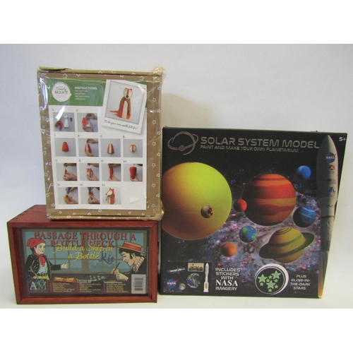 1337 - Three model kits including ship in a bottle, solar system, and needle felt fox