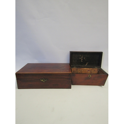 1343 - A 19th Century flame mahogany box of rectangular form (fitments missing). A similar tea caddy of sor... 