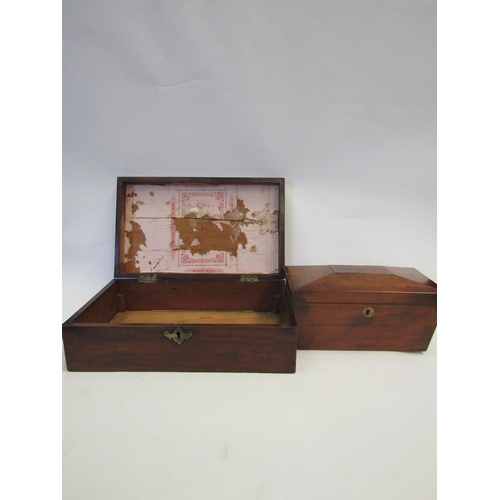 1343 - A 19th Century flame mahogany box of rectangular form (fitments missing). A similar tea caddy of sor... 