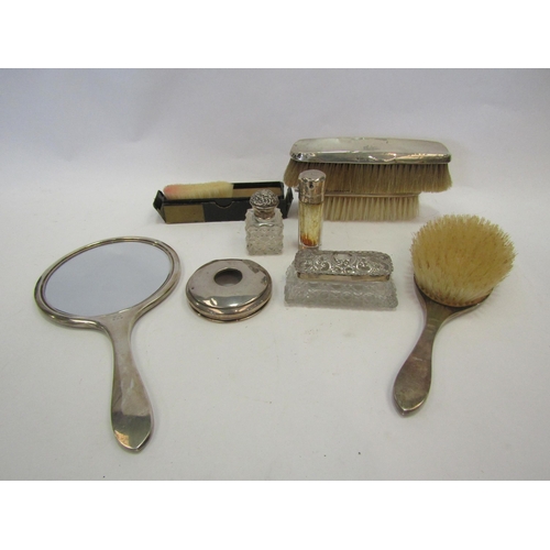 1370 - A silver dressing table set including brushes, hand mirror along with a silver lidded glass containe... 