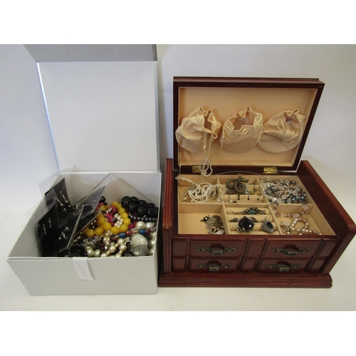 1379 - Two boxes containing a quantity of costume jewellery including bead necklaces, rings, etc,