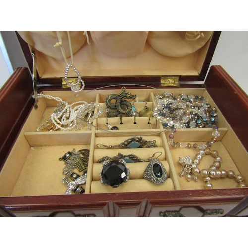 1379 - Two boxes containing a quantity of costume jewellery including bead necklaces, rings, etc,