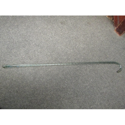 1382 - A glass walking stick with spiral twist inset, 95cm long