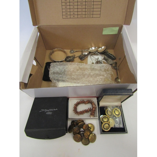 1390 - A box containing silver bangles, silver spoons, military buttons, etc