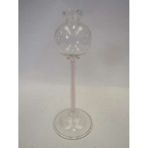 1395 - A glass lace makers lamp with spiral twist insert to stem, 21cm tall, a/f