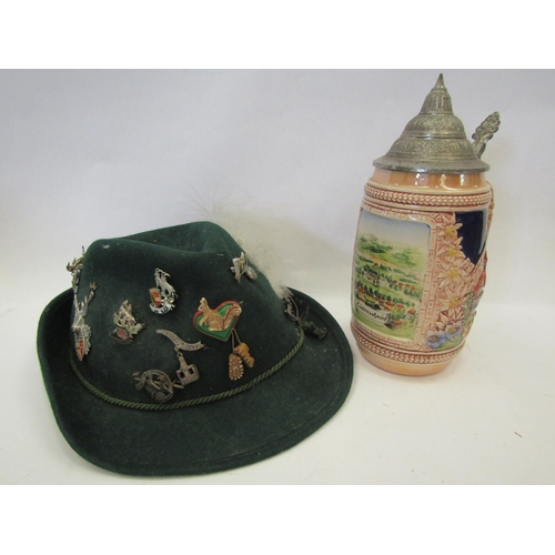 1396 - A German beer stein depicting Lüdenscheid along with a Bavarian hat fit with badges