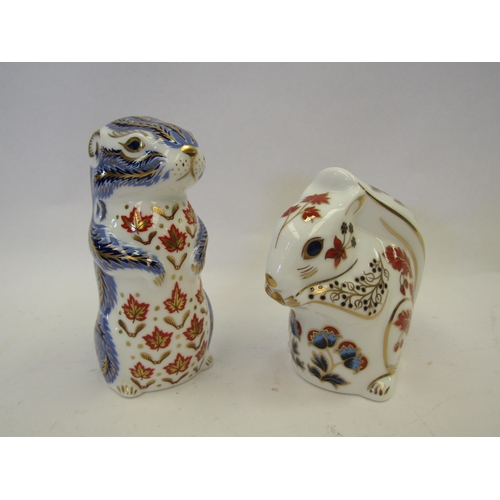 1410 - A Royal Crown Derby chipmunk and squirrel paperweights, both with silver stoppers