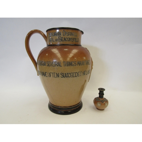 1419 - A Doulton Lambeth stoneware Benjamin Disraeli 1804-1881 commemorative jug, a/f, with a Doulton Lambe... 