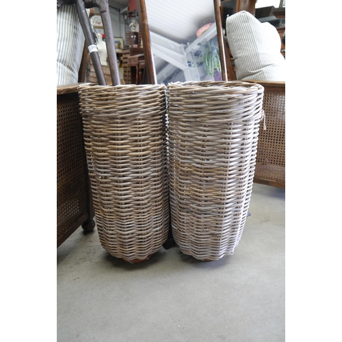 2004 - A pair of wicker umbrella stands