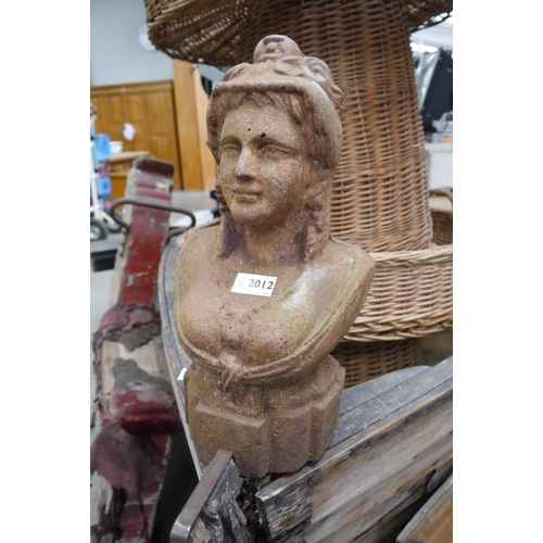 2012 - A cast iron bust of a busty lady 38cm tall