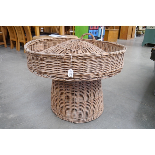 2016 - A large wicker display basket on stand