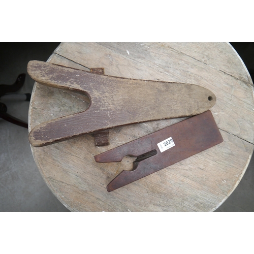 2029 - Two 19th Century oak and mahogany boot pulls