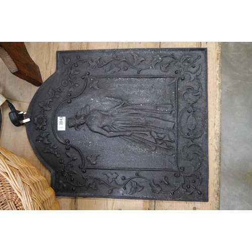 2043 - A cast iron fire back with Crinoline lady to centre 41 x 51cm