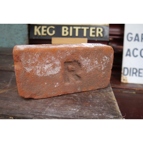 2079 - A small hand-made red brick with 