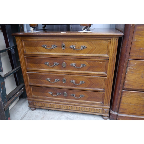 2088 - A 19th Century Continental walnut chest of four long drawers