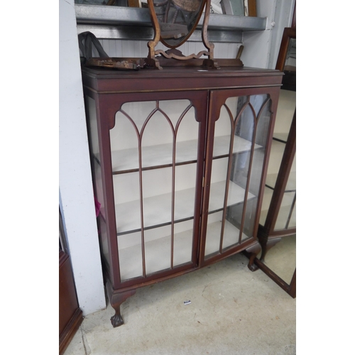 2104 - A 1930's mahogany glazed cabinet on cabriole ball and claw feet