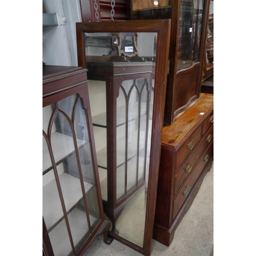 2106 - Two Edwardian oak and mahogany framed mirrors