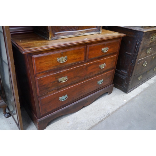 2107 - An Edwardian mahogany two over two chest of drawers