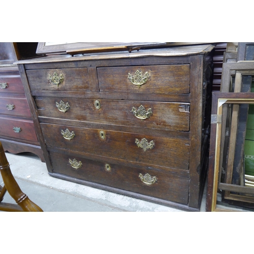 2110 - A Jacobean oak two over three chest of drawers, bottom drawer fixed shut