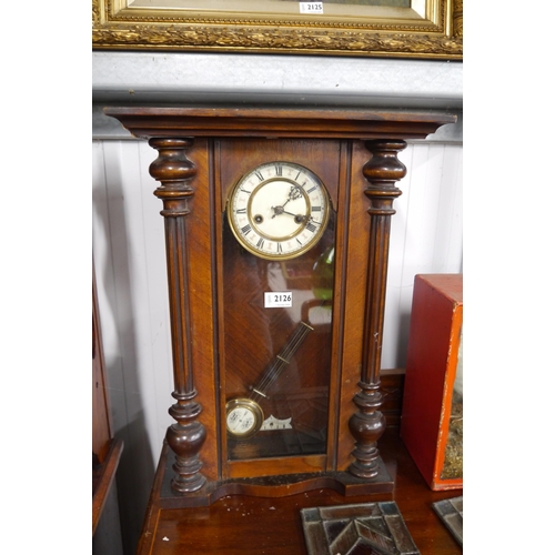 2126 - A continental walnut wall clock