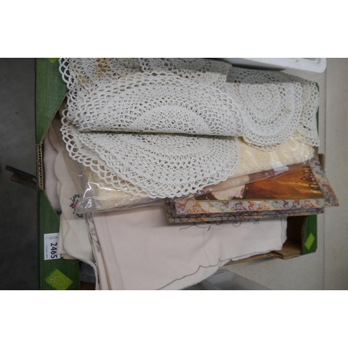 2465 - A box of lace and table cloths