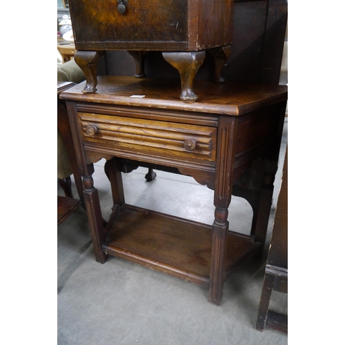 2485 - An Edwardian oak single drawer hall unit and two oak side tables