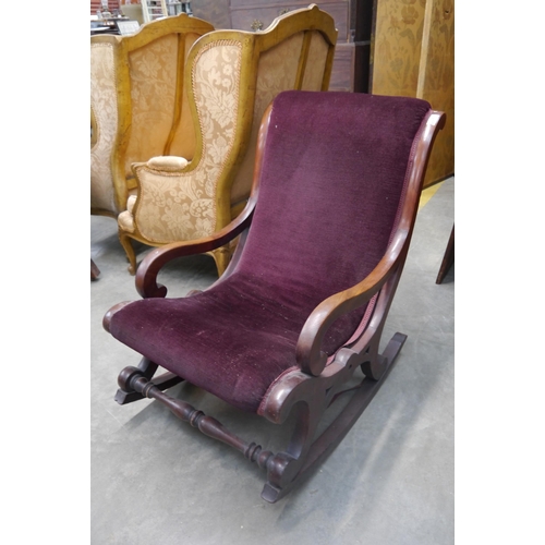 2495 - A 19th Century mahogany rocking chair