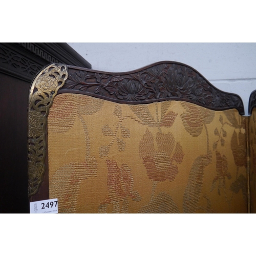 2497 - A four fold Oriental carved mahogany room divider, with brass detail