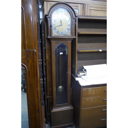 2500 - A brass faced oak Grandfather clock