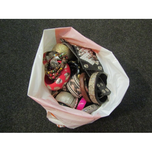 1448 - A bag of costume jewellery, mainly bangles and necklaces